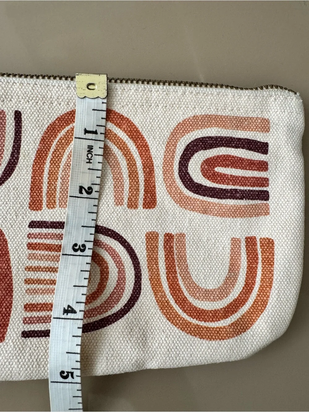 Danica Studio canvas zip pouch with terracotta rainbow screen-print design